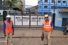 two-people-standing-wearing-safety-vest-and-hard-hat.jpg